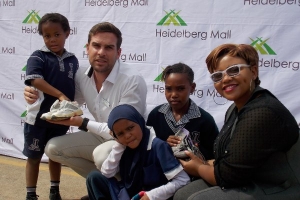 Heidelberg Mall shoe drive handover
